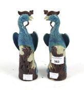 A pair of Chinese turquoise glazed birds.