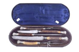 A Victorian steel and antler handled five piece carving set. The blades by John Wigfall & Co.