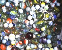 A quantity of assorted vintage glass marbles.