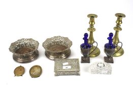 A collection of plated items to include a pair of candlesticks;