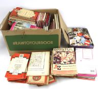 A collection of Ordnance Survey maps and a box of labels.