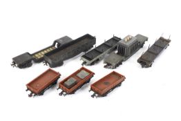 A collection of OO gauge flatbed wagons.