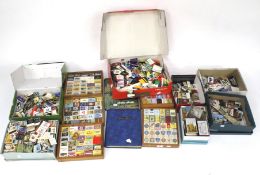 A large collection of assorted vintage matchboxes and match books.