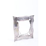 A silver-coloured metal picture frame.