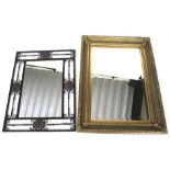 Two assorted contemporary wall mirrors.