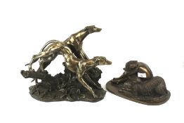 Two contemporary bronzed resin figurines.