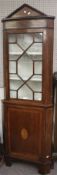 An Edwardian mahogany two section corner display cabinet.