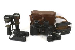 Four pairs of assorted binoculars. Including a cased pair of Wray Vu 8x30, etc.