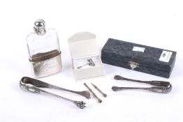 A late Victorian silver mounted clear facetted glass hip flask and other items.