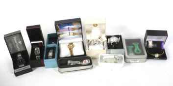 Twelve boxed lady's and gentleman's watches.
