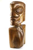 An African hardwood hand carved sculpture of a head. Signed Mwebe Epeditio '80.