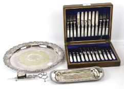 A set of twelve plated and mother of pearl handled tea knives and forks,
