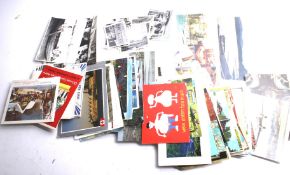 A collection of assorted picture postcards. Including a photo album and some loose.