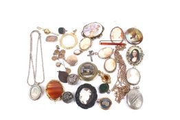 A collection of Victorian and later brooches and other items.
