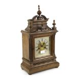 A 14 day oak cased pendulum mantle clock. With a German H.A.C.