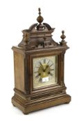 A 14 day oak cased pendulum mantle clock. With a German H.A.C.