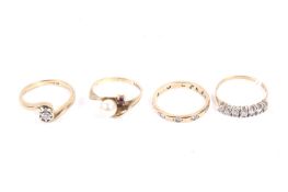 Four 9ct gold and gem set rings.