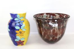 A contemporary glass vase and a china vase.