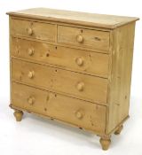 A 20th century pine chest of drawers.