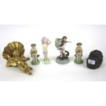 A collection of assorted 19th & 20th century figurines.