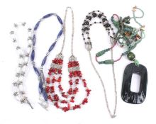 Five various Ethnic bead necklaces.