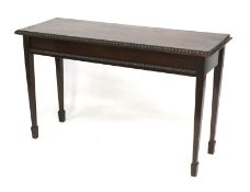 An Edwardian dark mahogany console hall table.