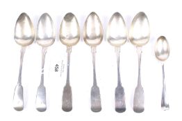 A set of six William IV Scottish silver fiddle pattern dessert spoons.