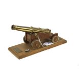 A presentation brass replica cannon from the Mary Rose. 'Canon Royal 68 PDR. 1545'.