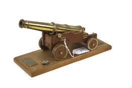 A presentation brass replica cannon from the Mary Rose. 'Canon Royal 68 PDR. 1545'.