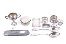 A collection of silver including an oval engine-turned napkin ring.