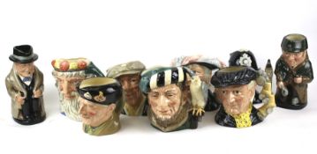 A collection of nine assorted Royal Doulton Toby and character jugs.