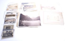 A collection of Victorian and later photographs and postcards.