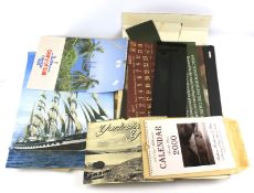 A collection of vintage calendars. Inclu