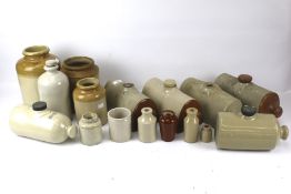 A collection of stoneware. Including storage jars, pots, etc.