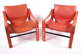 Vintage / Retro : Maurice Burk for Arkana, a pair of orange/red Safari chairs.