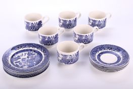 A set of Churchill 'Willow' pattern tea cups and saucers. A trio for six people.