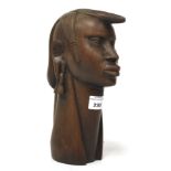 A West African carved hardwood head.