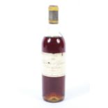 A 1965 bottle of Chateau d'Yquem, Sauternes-Appellation Controlee, 75cl.