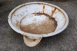 A large vintage metal pan.