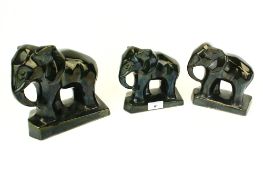 A set of three Art Deco glazed terracotta elephants. Graduated sizes max.