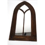 A Gothic cusped wood framed mirror.