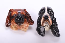 Two vintage Crown Devon Fielding's Dog wall plaques.