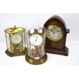 Three assorted mantel clocks.