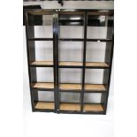A single wooden open display bookcase and a double unit.