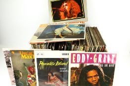 An assortment of vinyl LP 33 RPM records.