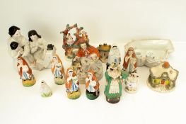 A collection of Staffordshire pottery figures.