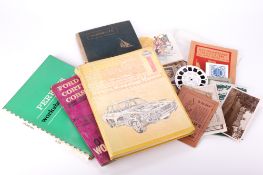 A collection of assorted vintage ephemera. Including photos of famous people, car manuals, etc.