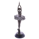 A contemporary bronze figure of ballerina. On a black marble plinth.