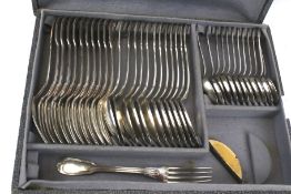 A vintage French canteen of silver plated spoons and forks.
