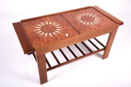 Vintage / Retro : A mid-century extending tile top coffee table.